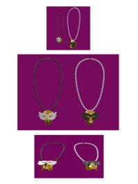 a set of necklaces and earrings on a purple background